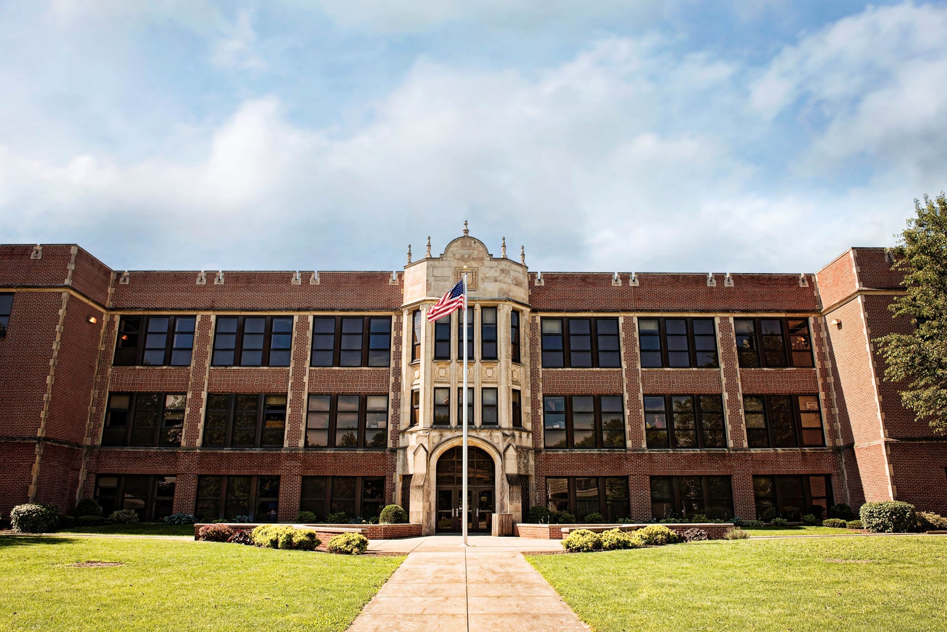 a building with a flag on the front