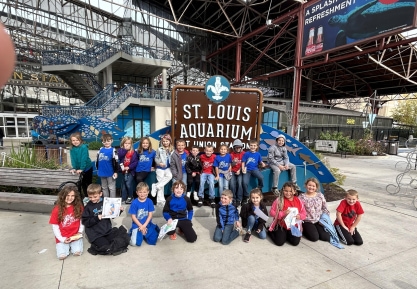 a group of children posing for a photo